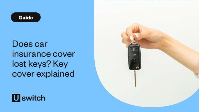 a hand holding a set of car keys